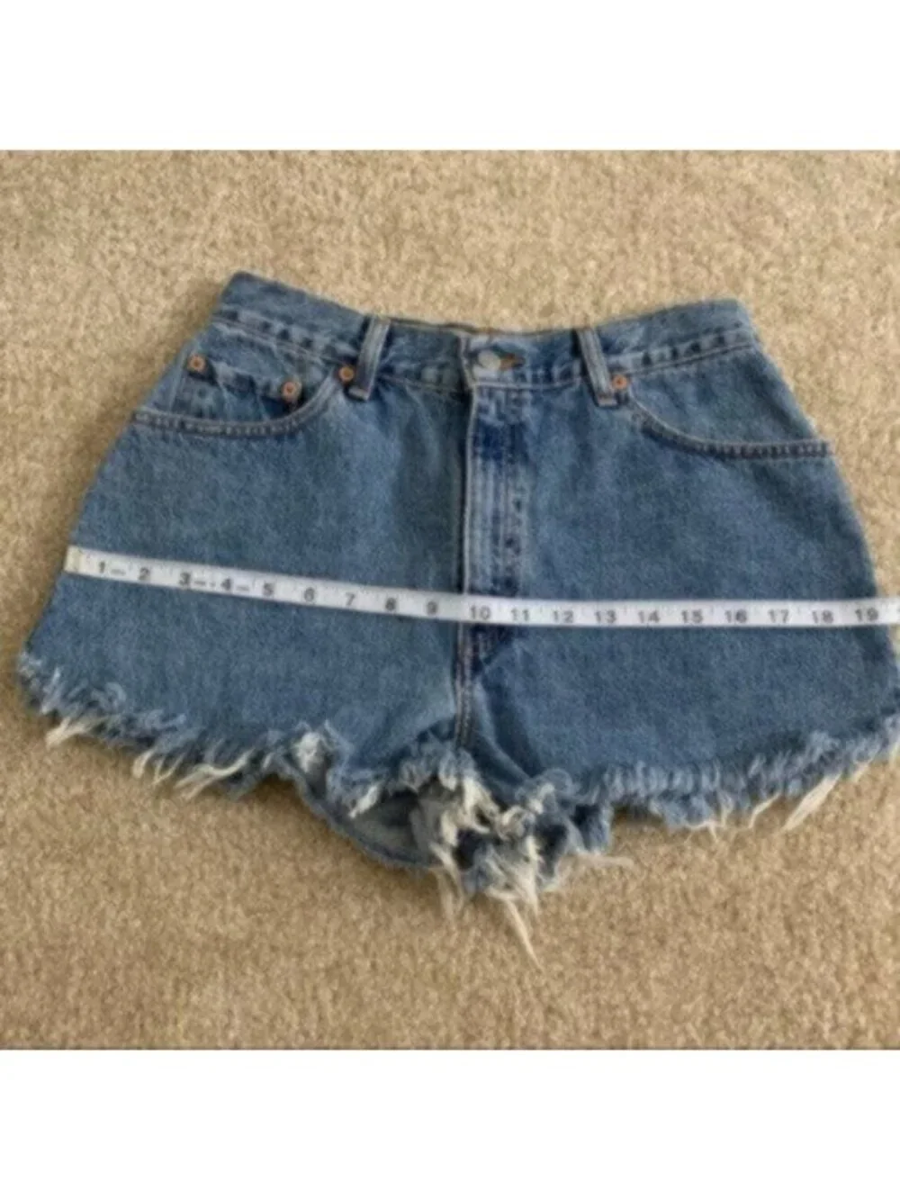 Levi’s 550 Original Raw-Edge Denim Shorts - Picture 8 of 11